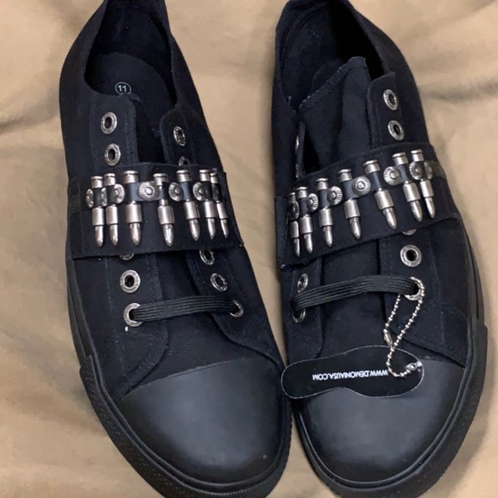 New women’s striking Demonia sneakers sz 8.5 9